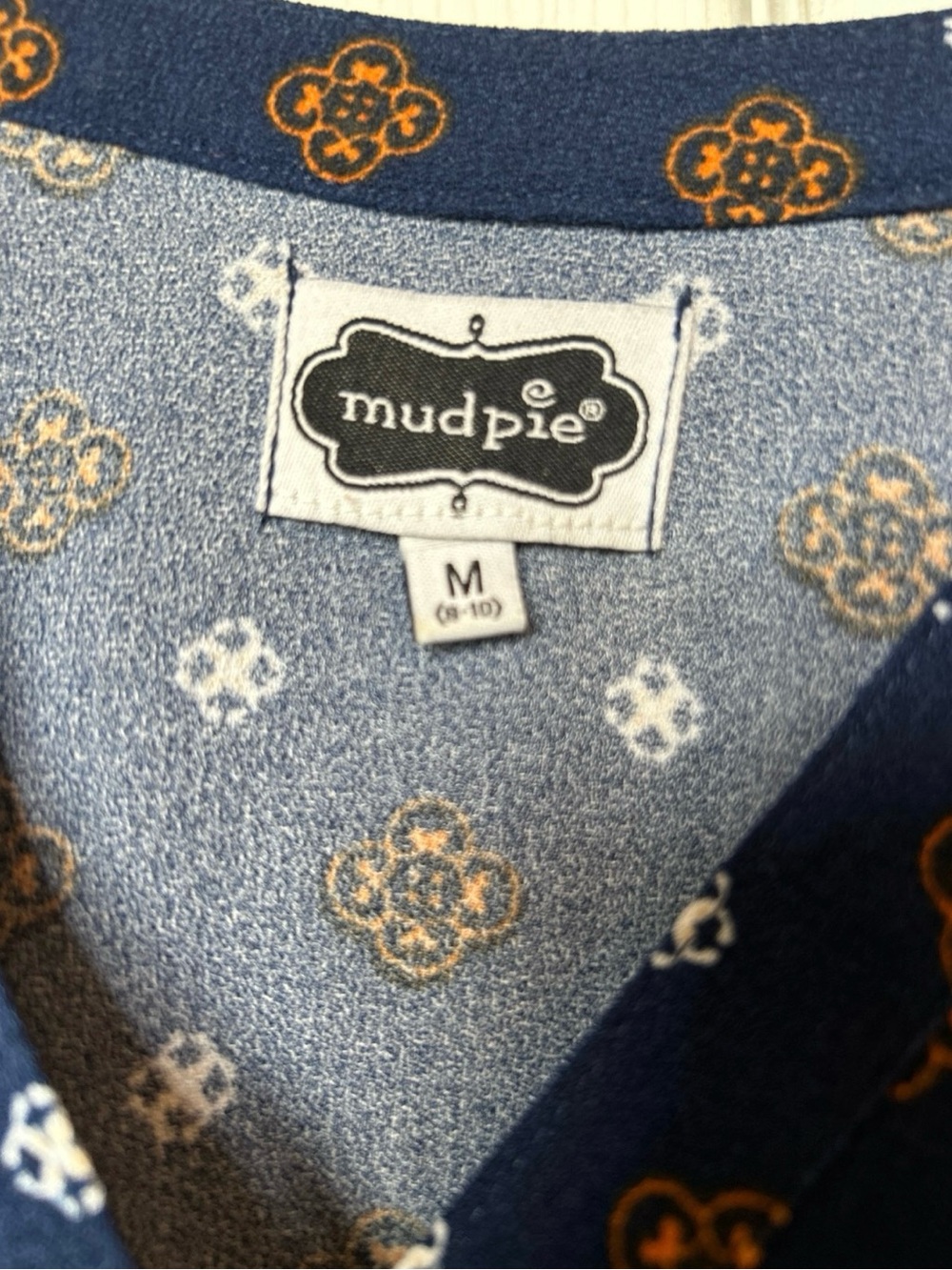 Mud Pie Navy Blue Shirt with Cream and Orange Motif